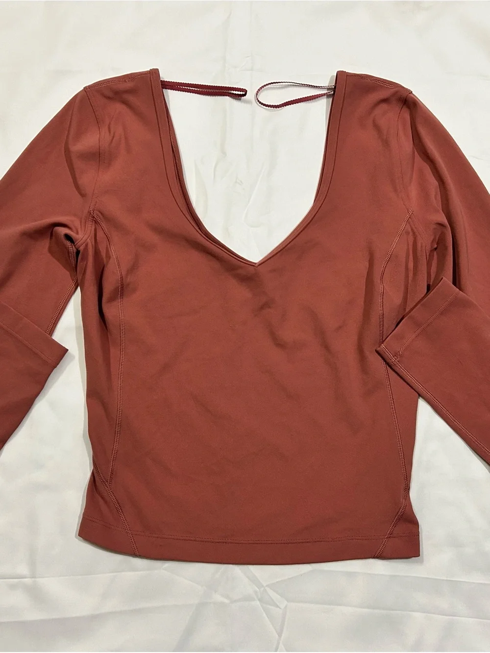 lululemon athletica Long Sleeve V-Neck Top in Rust Red